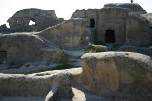 The remains of walls and carved out buildings have been blasted into a variety of strange shapes that range from melted wax to waves on the ocean.