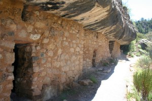 A row of homes in the canyon almost looks like a scene from the Smurfs.  The placement of their front walls makes the homes look like long stocky mushrooms.