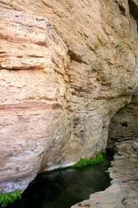 The outflow channel runs along the side of the well as it heads toward fields that still use it today for agricultural irrigation.  