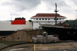 Miraflores locks station surrounded by giant ships heading back into the Pacific Ocean. Carrying goods from Europe and the United States mostly.
